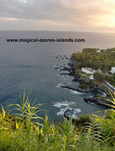 watching the sun set in Caloura, Sao Miguel Azores