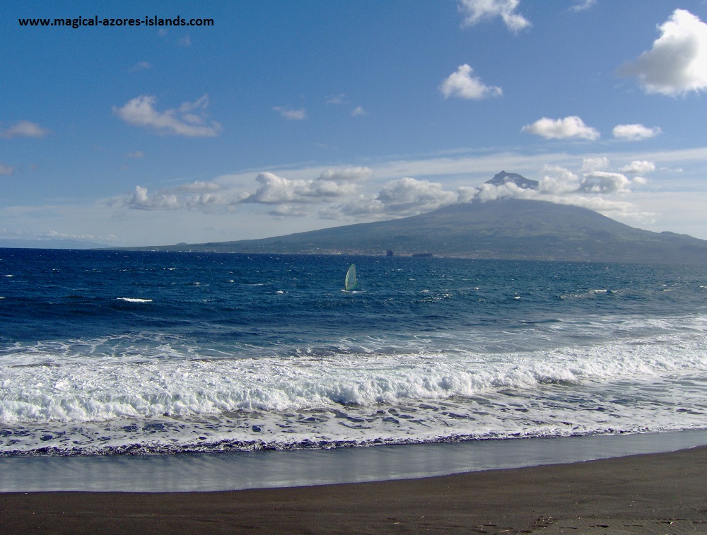 Azores Photos - a view of Pico from Faial. Love the windsurfer zipping along in the Atlantic Ocean