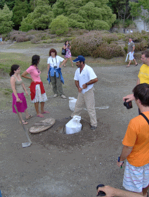 Cozida being put in ground to cook at Furnas lake